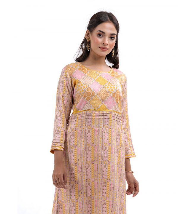 Off-white all-over printed straight-cut kameez in Crepe fabric. Embellished with zari embroidery on the top front and pintucks.