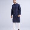 Blue fitted Panjabi in Cotton fabric. Designed with a mandarin collar and matching metal buttons on the placket. Embellished with minimal embroidery on the chest.