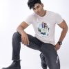 Slim fitted jeans in cotton spandex denim fabric. Five pockets, button fastening on the front and zipper fly.