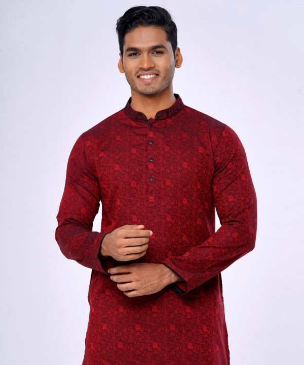 Red semi-fitted Panjabi in Jacquard Cotton fabric. Designed with a mandarin collar and button fastening on the chest.