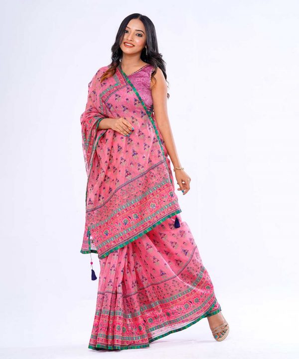 Pink all-over printed exclusive Saree in Muslin fabric with a multi-color border. Embellished with karchupi, on the achal.