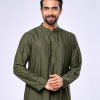 Green Semi fitted Panjabi in Jacquard Cotton fabric. Embellished with swing stitches on the collar and placket. Matching metal button fastening on the chest.