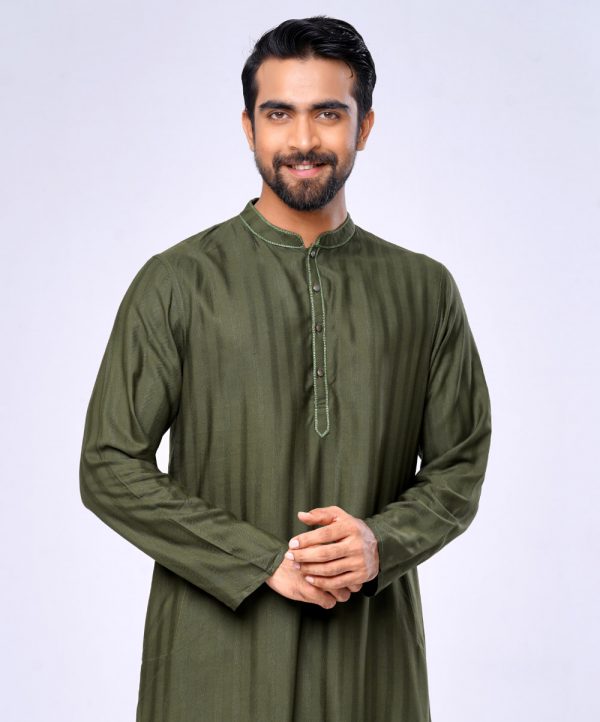 Green Semi fitted Panjabi in Jacquard Cotton fabric. Embellished with swing stitches on the collar and placket. Matching metal button fastening on the chest.