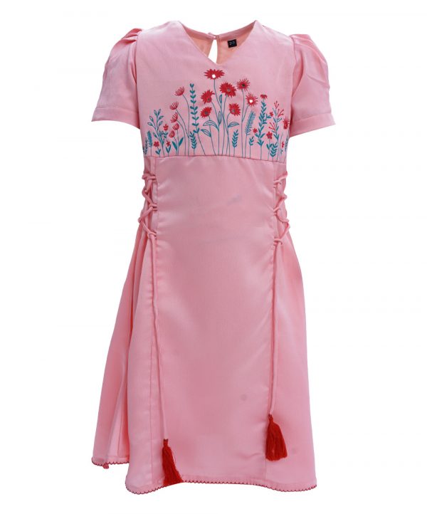 Pink A-line frock in Crepe fabric. Designed with a V-neck, puff sleeves and corset cords at the front. Embellished with flower print and embroidery at the top front. Single button opening at the back.