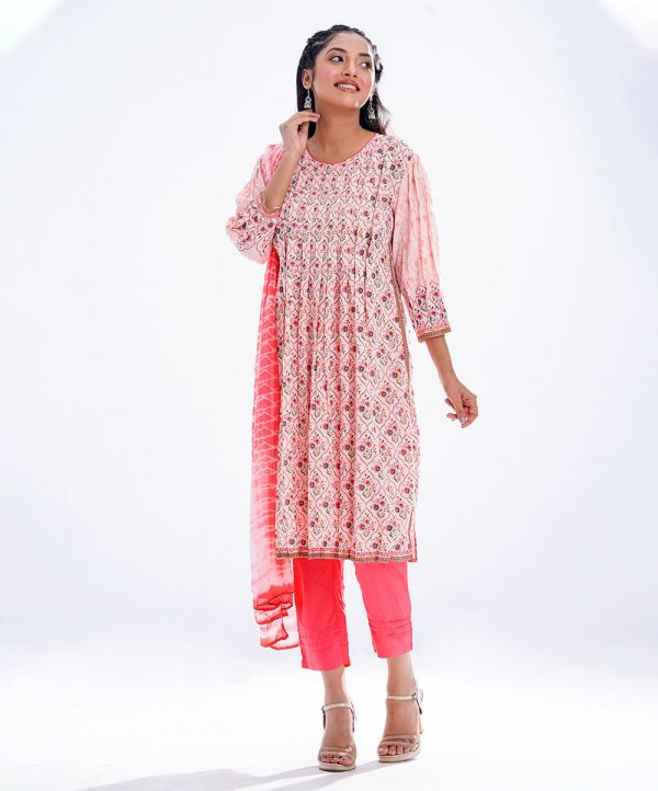 Pink all-over printed Salwar Kameez in Viscose fabric. The Kameez features a round neck and three-quarter sleeves. Embellished with pleats at the front and gathers from the waistline. Complemented by culottes pants with pin tucks border and tie-dye chiffon dupatta.