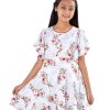 White Georgette A-line Tunic in printed Georgette fabric. Features a round neck with button opening at the front and butterfly sleeves. Spliced gather hemline.