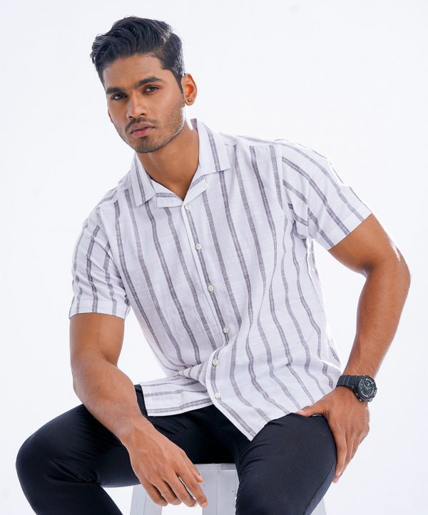 White striped casual Shirt in printed slab Cotton fabric. Designed with a Cuban collar and short sleeves.