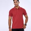 Red Polo Shirt in Cotton Pique fabric. Designed with a classic collar and short sleeves. Contrast tipping at the collar and cuffs.