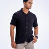 Black all-over printed casual shirt in Viscose fabric. Designed with a cuban collar and short sleeves.