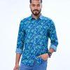 Blue casual shirt in printed Cotton fabric. Designed with a classic collar and long sleeves with adjustable buttons at the cuffs. Slim fit.