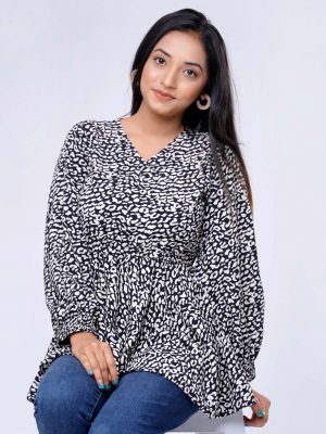 Black all-over printed retro wrap style Woven Top in Georgette fabric. Designed with a V neck and smoky puff Sleeves. Detailed with a Concealed elastication on the waistline.