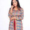 Red double layer Tunic in Printed Georgette fabric. Designed with a round neck and three-quarter sleeves. Embellished with printed patch attachment at the front, neck and hemline.