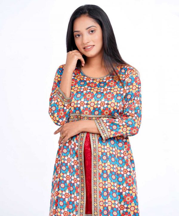 Red double layer Tunic in Printed Georgette fabric. Designed with a round neck and three-quarter sleeves. Embellished with printed patch attachment at the front, neck and hemline.