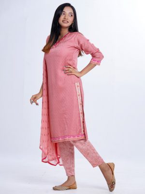 Pink printed Salwar Kameez in textured Silk-blend and Crepe fabric. The Kameez is designed with a V-neck and three-quarter sleeves. Embellished with embroidery at the neckline. Complemented by Crepe palazzo pants and a Chiffon dupatta.