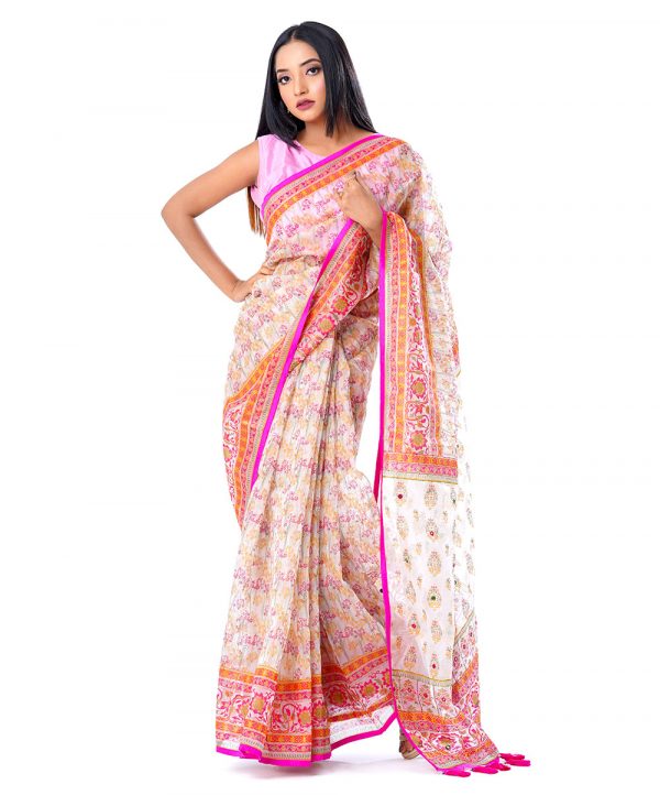 White all-over printed exclusive Saree in Muslin fabric with a Pink border. Embellished with karchupi, on the achal.