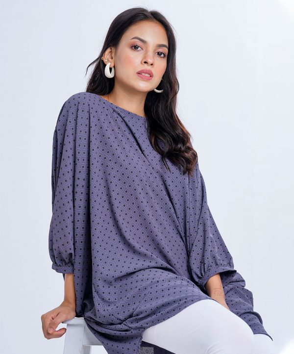 Gray all-over printed abaya style Tunic in Georgette fabric. Designed with a round neck and batwing dolman sleeves. Single button opening at the back. Unlined.