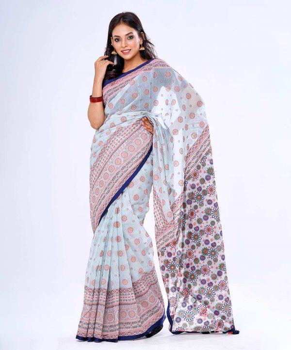 Blue all-over printed Saree in Half-silk fabric. Embellished with karchupi and decorative tassels on the achal.