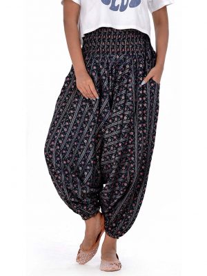 Black all-over printed Harem pants in Viscose fabric. Designed with smoked waistline with adjustable tasseled waist cords.