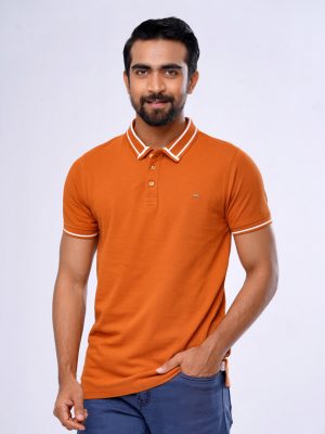 Orange Polo Shirt in Cotton pique fabric. Designed with a classic collar, short sleeves, and a metal logo attachment at the chest. Contrast tipping at collar and cuffs.