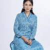 Sky blue all-over printed straight-cut Kameez in Georgette fabric. Features a V-neck with and three-quarter sleeves. Embellished with karchupi at the front. Unlined.