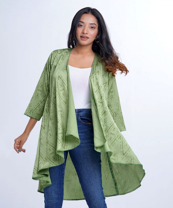 Green all-over printed Shrug in Crepe fabric. Designed with three-quarter sleeves and high-low hemline.