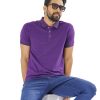 Purple Polo Shirt in Cotton pique fabric. Designed with a classic collar, short sleeves and logo embroidered at the chest.