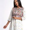 White all-over printed Shrug in Crepe and Georgette fabric. Designed with a mandarin collar and three-quarter sleeves. Embellished with karchupi at the front. Patch attachment at the slits, cuffs and hemline.
