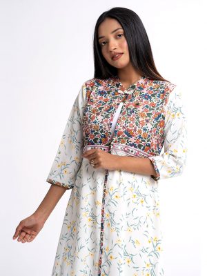 White all-over printed Shrug in Crepe and Georgette fabric. Designed with a mandarin collar and three-quarter sleeves. Embellished with karchupi at the front. Patch attachment at the slits, cuffs and hemline.