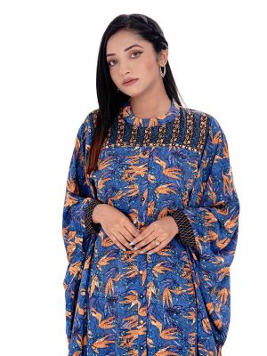 Blue Abaya style Tunic in printed Georgette fabric. Features a low mock neck and batwing sleeves. Embellished with embroidery at the top front