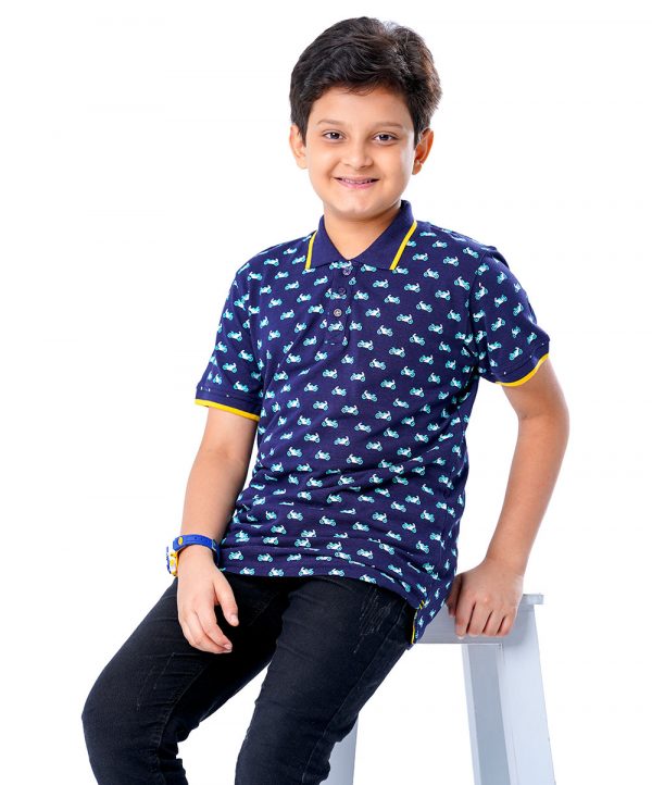 Blue all-over printed Polo Shirt in Cotton pique fabric. Designed with a classic collar and short sleeves. Contrast tipping at collar and cuffs.