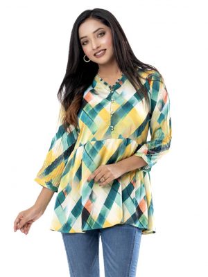 Multi-color A-line Tunic in printed Georgette fabric. Designed with a V-neck and three-quarter sleeves.