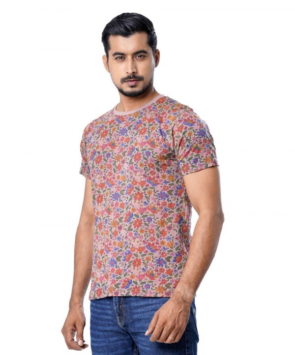 Multi-color all-over floral printed T-Shirt in Cotton single jersey fabric. Designed with a crew neck and short sleeves.