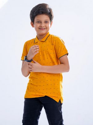 Yellow all-over printed Polo Shirt in Cotton pique fabric. Designed with a classic collar and short sleeves. Contrast tipping at collar and cuffs.