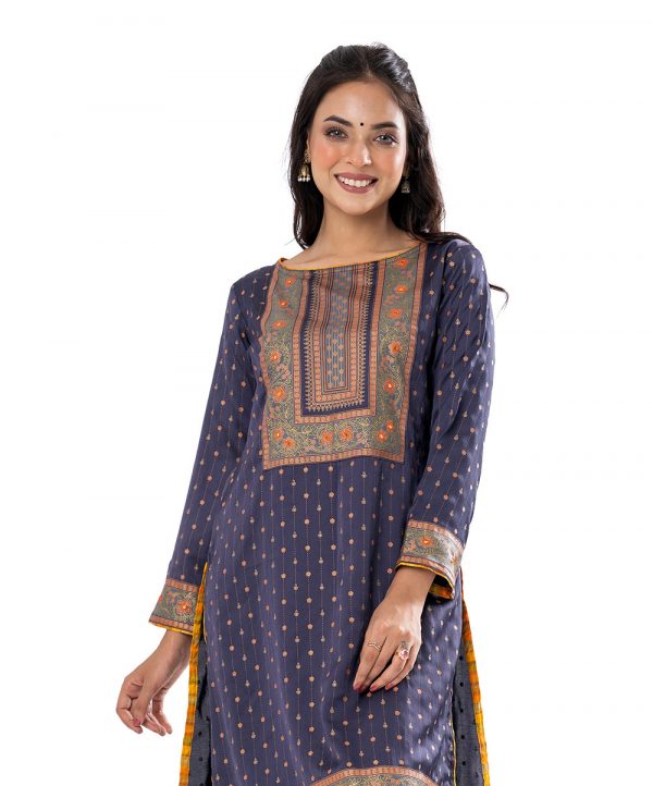 Navy Blue all-over printed straight-cut Kameez in Crepe fabric. Designed with a round neck and three-quarter sleeves. Embellished with karchupi at the top front and cuffs. Unlined.