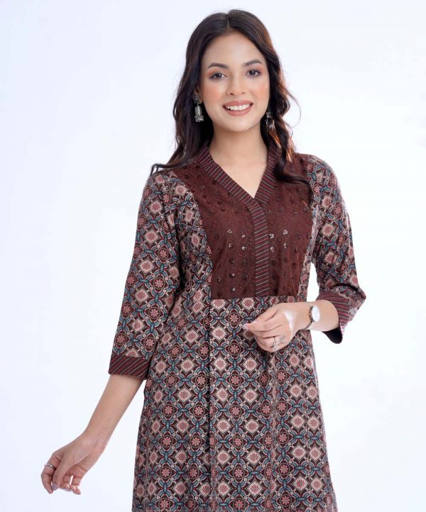 Chocolate all-over printed straight-cut Kameez in Georgette fabric. Features a V-neck with hook closure at the front and three-quarter sleeves. Detailed with embroidered net attachment at the top front. Embellished with swing stitched patch attachment at the neck and cuffs. Pleats from the waistline. Unlined.