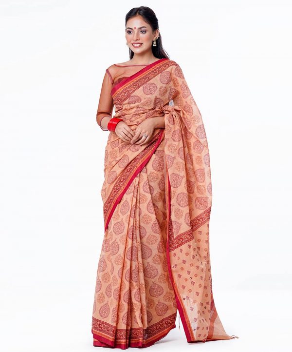Brown all-over printed Cotton Saree with contrast red border. Embellished with embroidery on the achal.