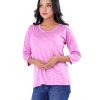Pink all-over printed T-shirt in Cotton single jersey fabric. Features a round neck and three-quarter sleeves.