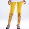 Yellow all-over printed legging in stretchable Cotton fabric. Concealed elastication at the waistline.