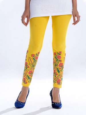 Yellow all-over printed legging in stretchable Cotton fabric. Concealed elastication at the waistline.