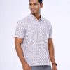 White all-over printed comfort Shirt in slab Cotton fabric. Designed with a classic collar and short sleeves.