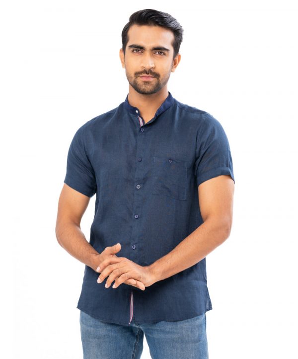 Navy Blue casual shirt in Ramie Cotton fabric. Designed with a mandarin collar, short sleeves and a chest pocket.
