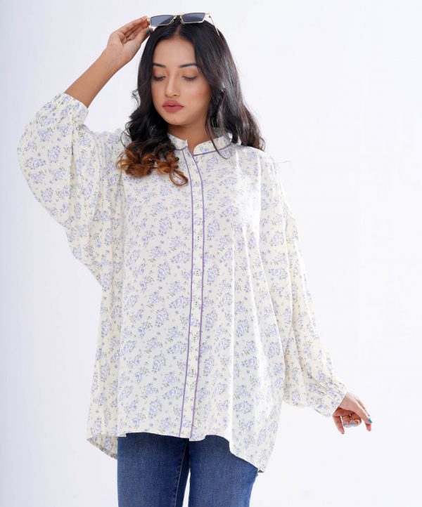 Mint Yellow Abaya style Tunic in printed Georgette fabric. Features a mandarin collar with a front button opening and batwing sleeves. Unlined.