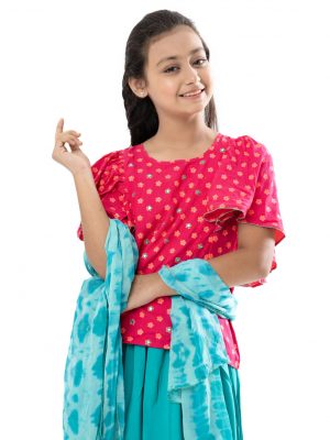 Magenta and Turquoise all-over printed Ghagra-choli set in Viscose fabric. The top is designed with a round neck and butterfly sleeves. Embellished embroidery at the top front. Button opening at the back. Paired with the gathered skirt with a concealed elasticated waistline. Spliced gather hemline. Complemented with tie-dye chiffon dupatta.