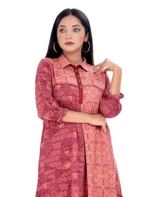 Salmon Pink A-line Tunic in Georgette fabric. Designed with a shirt collar and bishop sleeves. Embellished with embroidery at the top front.
