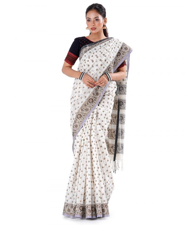 White all-over printed Saree in Cotton fabric.