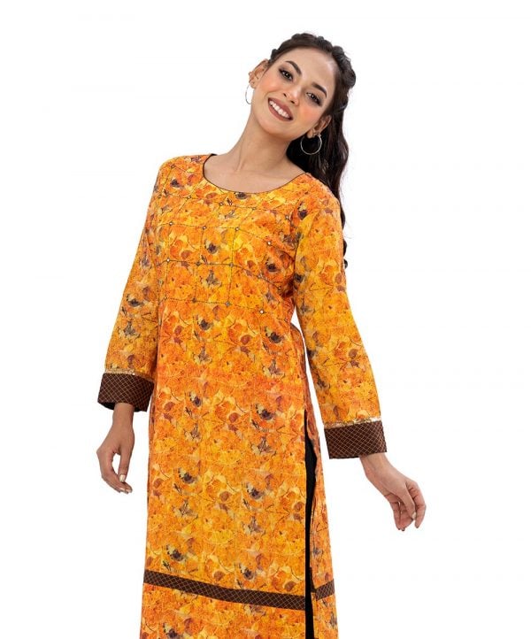 Yellow all-over printed straight-cut Kameez in Viscose fabric. Features a round neck and long sleeves. Embellished with embroidery at the front. Patch attachment at the cuffs and hemline.