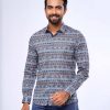 Blue casual shirt in printed Cotton fabric. Designed with a classic collar and long-sleeved with adjustable button at cuffs. Slim fit.