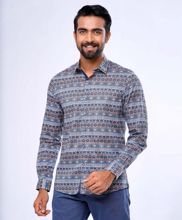 Blue casual shirt in printed Cotton fabric. Designed with a classic collar and long-sleeved with adjustable button at cuffs. Slim fit.