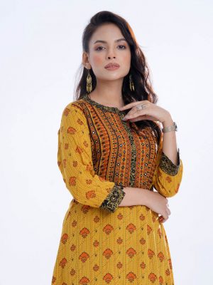 Yellow all-over printed A-line Tunic in Viscose fabric. Designed with a band neck and three-quarter sleeves. Embellished with embroidery at the front and back. Elongated hemline.