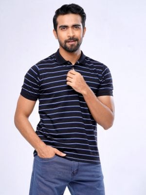 Blue stripe Polo in Cotton Pique fabric. Designed with a classic collar and short sleeves.